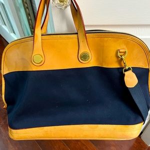 Dooney & Bourke XL Weekender navy canvas with Vechetta leather.